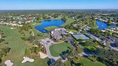 A spectaculate view awaits you as you enter this bright, airy on Eastpointe Country Club in Florida - for sale on GolfHomes.com, golf home, golf lot