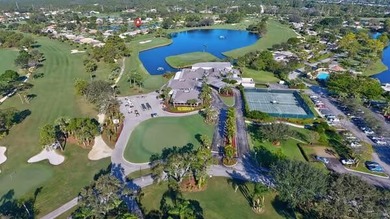 A spectaculate view awaits you as you enter this bright, airy on Eastpointe Country Club in Florida - for sale on GolfHomes.com, golf home, golf lot