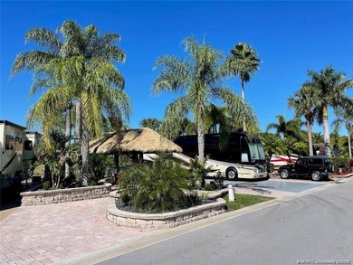 Discover the epitome of resort living on this expansive 70-foot on St. Lucie Trail Golf Club in Florida - for sale on GolfHomes.com, golf home, golf lot