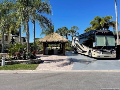 Discover the epitome of resort living on this expansive 70-foot on St. Lucie Trail Golf Club in Florida - for sale on GolfHomes.com, golf home, golf lot