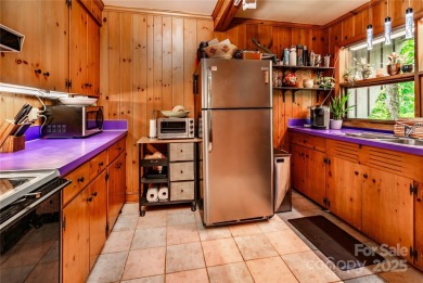 Designed in 1963 by renowned architect Fritz Schmidt, this on Quail Hollow Club in North Carolina - for sale on GolfHomes.com, golf home, golf lot