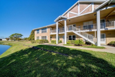 Beautifully RENOVATED second floor unit with GOLF COURSE views on The Dunedin Country Club in Florida - for sale on GolfHomes.com, golf home, golf lot