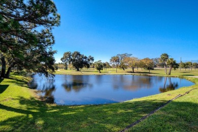 Beautifully RENOVATED second floor unit with GOLF COURSE views on The Dunedin Country Club in Florida - for sale on GolfHomes.com, golf home, golf lot