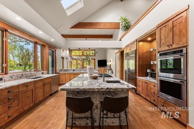 An extraordinary 1.5+ acre riverfront estate enveloped by water on BanBury Golf Club in Idaho - for sale on GolfHomes.com, golf home, golf lot