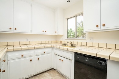 This lovely beach home resides in the center of the Huntington on Meadowlark Golf Club in California - for sale on GolfHomes.com, golf home, golf lot