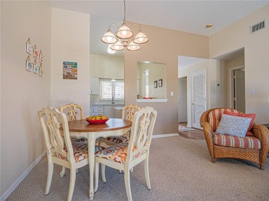 Sweeping golf views from this pied-a-terre in prestigious on Oak Harbor Country Club in Florida - for sale on GolfHomes.com, golf home, golf lot