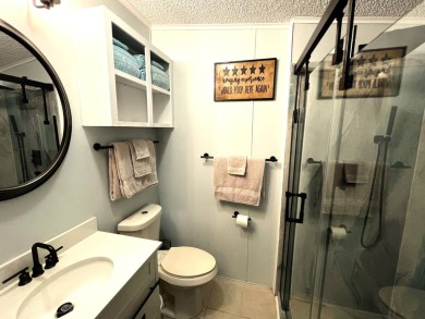Discover your ideal retreat with this meticulously designed on Lake Henry Golf Club in Florida - for sale on GolfHomes.com, golf home, golf lot