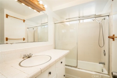 This lovely beach home resides in the center of the Huntington on Meadowlark Golf Club in California - for sale on GolfHomes.com, golf home, golf lot