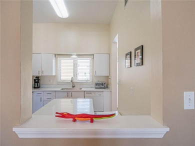 Sweeping golf views from this pied-a-terre in prestigious on Oak Harbor Country Club in Florida - for sale on GolfHomes.com, golf home, golf lot
