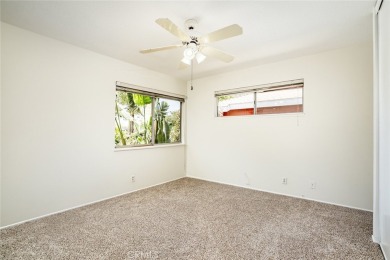 This lovely beach home resides in the center of the Huntington on Meadowlark Golf Club in California - for sale on GolfHomes.com, golf home, golf lot