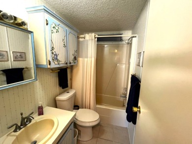 Discover your ideal retreat with this meticulously designed on Lake Henry Golf Club in Florida - for sale on GolfHomes.com, golf home, golf lot