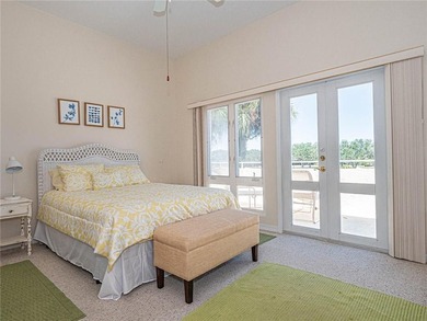 Sweeping golf views from this pied-a-terre in prestigious on Oak Harbor Country Club in Florida - for sale on GolfHomes.com, golf home, golf lot