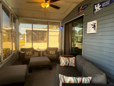 Discover your ideal retreat with this meticulously designed on Lake Henry Golf Club in Florida - for sale on GolfHomes.com, golf home, golf lot