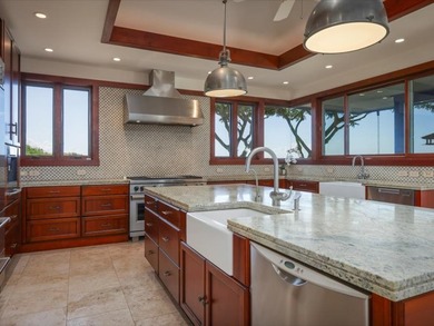 Spanning 4,146 sf of living space with 6,270 sf under roof, this on Club At Hokulia in Hawaii - for sale on GolfHomes.com, golf home, golf lot