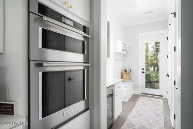 Completed in 2023 and lovingly maintained by its original owners on Bald Head Island Golf Club in North Carolina - for sale on GolfHomes.com, golf home, golf lot