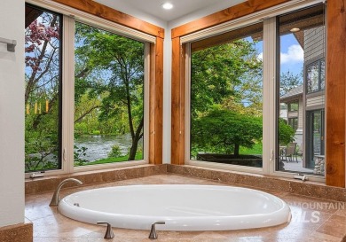 An extraordinary 1.5+ acre riverfront estate enveloped by water on BanBury Golf Club in Idaho - for sale on GolfHomes.com, golf home, golf lot