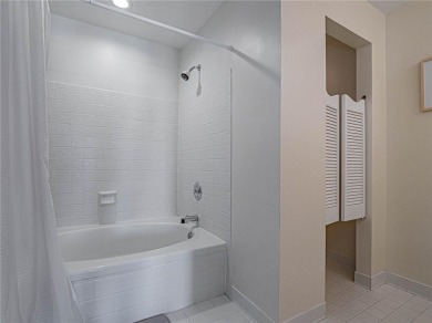 Sweeping golf views from this pied-a-terre in prestigious on Oak Harbor Country Club in Florida - for sale on GolfHomes.com, golf home, golf lot