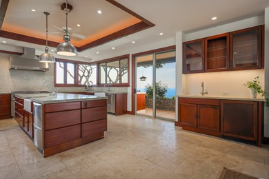 Spanning 4,146 sf of living space with 6,270 sf under roof, this on Club At Hokulia in Hawaii - for sale on GolfHomes.com, golf home, golf lot