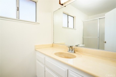 This lovely beach home resides in the center of the Huntington on Meadowlark Golf Club in California - for sale on GolfHomes.com, golf home, golf lot