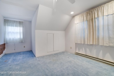 Contemporary chalet in a private golf course community! This on Pocono Farms Country Club in Pennsylvania - for sale on GolfHomes.com, golf home, golf lot