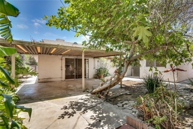 This lovely beach home resides in the center of the Huntington on Meadowlark Golf Club in California - for sale on GolfHomes.com, golf home, golf lot