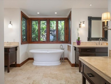 Spanning 4,146 sf of living space with 6,270 sf under roof, this on Club At Hokulia in Hawaii - for sale on GolfHomes.com, golf home, golf lot