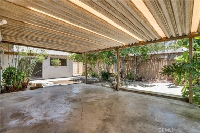 This lovely beach home resides in the center of the Huntington on Meadowlark Golf Club in California - for sale on GolfHomes.com, golf home, golf lot