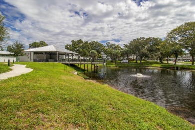 If you are looking for a 1st floor condo walking distance to the on On Top Of The World Golf Course in Florida - for sale on GolfHomes.com, golf home, golf lot