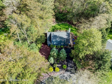 Contemporary chalet in a private golf course community! This on Pocono Farms Country Club in Pennsylvania - for sale on GolfHomes.com, golf home, golf lot