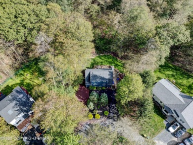 Contemporary chalet in a private golf course community! This on Pocono Farms Country Club in Pennsylvania - for sale on GolfHomes.com, golf home, golf lot