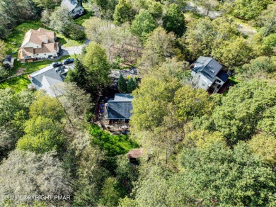 Contemporary chalet in a private golf course community! This on Pocono Farms Country Club in Pennsylvania - for sale on GolfHomes.com, golf home, golf lot