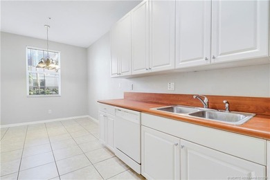 Spacious 3-bedroom, 2 1/2 bath townhouse with a one-car garage on Abacoa Golf Club in Florida - for sale on GolfHomes.com, golf home, golf lot