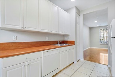 Spacious 3-bedroom, 2 1/2 bath townhouse with a one-car garage on Abacoa Golf Club in Florida - for sale on GolfHomes.com, golf home, golf lot