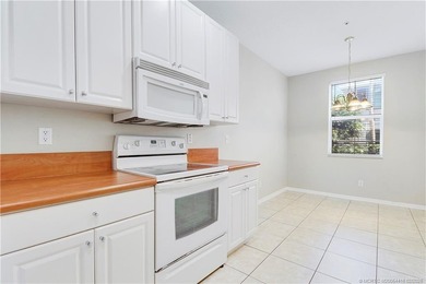 Spacious 3-bedroom, 2 1/2 bath townhouse with a one-car garage on Abacoa Golf Club in Florida - for sale on GolfHomes.com, golf home, golf lot