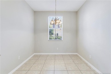 Spacious 3-bedroom, 2 1/2 bath townhouse with a one-car garage on Abacoa Golf Club in Florida - for sale on GolfHomes.com, golf home, golf lot