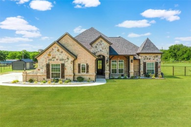 A MUST SEE! This wonderful 2020-built home, located in the on Bridgeport Country Club in Texas - for sale on GolfHomes.com, golf home, golf lot