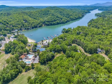 Enjoy a peaceful and scenic wooded setting on 2.77 acres, with on Rumbling Bald Resort on Lake Lure in North Carolina - for sale on GolfHomes.com, golf home, golf lot