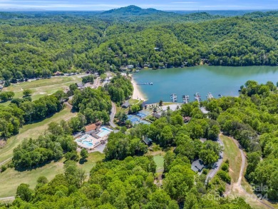 Enjoy a peaceful and scenic wooded setting on 2.77 acres, with on Rumbling Bald Resort on Lake Lure in North Carolina - for sale on GolfHomes.com, golf home, golf lot