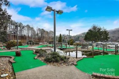 Enjoy a peaceful and scenic wooded setting on 2.77 acres, with on Rumbling Bald Resort on Lake Lure in North Carolina - for sale on GolfHomes.com, golf home, golf lot