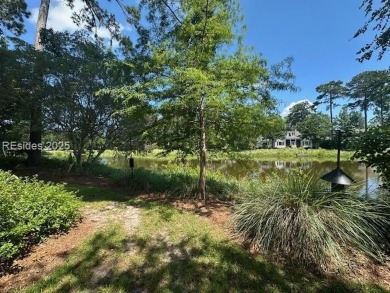 Timeless Lowcountry charm meets effortless luxury in the heart on Oldfield Golf Club in South Carolina - for sale on GolfHomes.com, golf home, golf lot