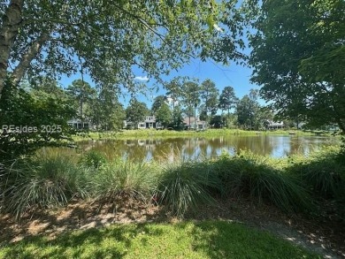 Timeless Lowcountry charm meets effortless luxury in the heart on Oldfield Golf Club in South Carolina - for sale on GolfHomes.com, golf home, golf lot