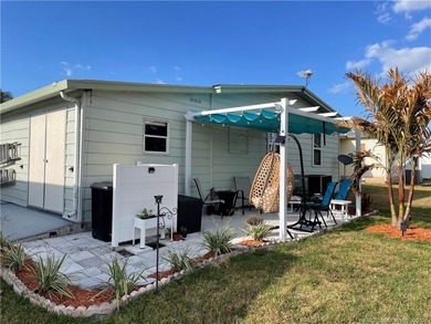 This gorgeous home was completely remodeled in 2023. THIS IS A on Indianwood Golf and Country Club in Florida - for sale on GolfHomes.com, golf home, golf lot