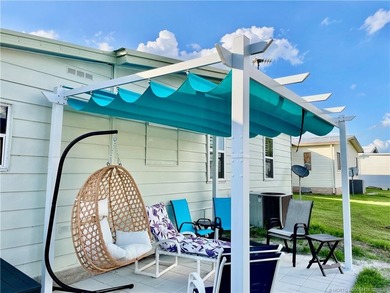 This gorgeous home was completely remodeled in 2023. THIS IS A on Indianwood Golf and Country Club in Florida - for sale on GolfHomes.com, golf home, golf lot