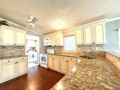 Live the Florida lifestyle you've always imagined in this on Apollo Beach Golf and Sea Club in Florida - for sale on GolfHomes.com, golf home, golf lot