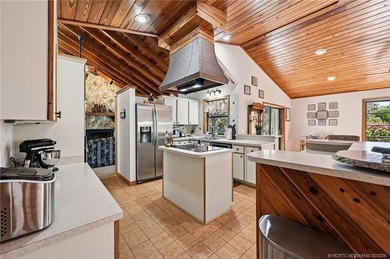 RARE ACRE RETREAT IN MARTIN DOWNS! Experience the perfect blend on Martin Downs Country Club in Florida - for sale on GolfHomes.com, golf home, golf lot