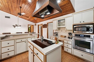 RARE ACRE RETREAT IN MARTIN DOWNS! Experience the perfect blend on Martin Downs Country Club in Florida - for sale on GolfHomes.com, golf home, golf lot