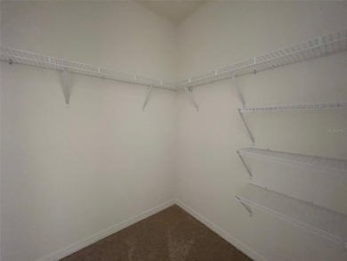 Enjoy Corner-Unit Townhouse with Golf Course Views -Davenport on Ridgewood Lakes Golf and Country Club in Florida - for sale on GolfHomes.com, golf home, golf lot