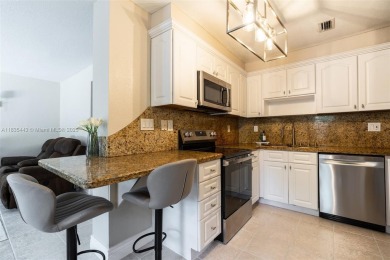 Welcome to this beautifully renovated 3 bed / 2.5 bath corner on Davie Golf Club in Florida - for sale on GolfHomes.com, golf home, golf lot