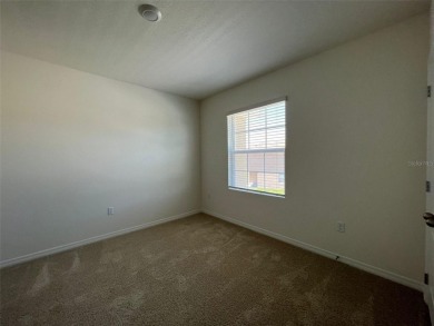 Enjoy Corner-Unit Townhouse with Golf Course Views -Davenport on Ridgewood Lakes Golf and Country Club in Florida - for sale on GolfHomes.com, golf home, golf lot