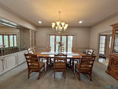This stunning custom home, rich in history, was built by the on Spring River Golf Course in New Mexico - for sale on GolfHomes.com, golf home, golf lot